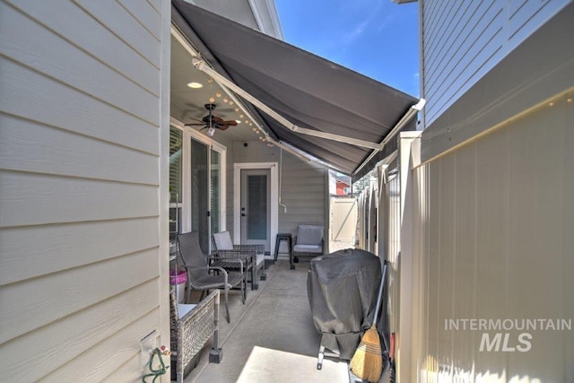 view of patio / terrace featuring ceiling fan and area for grilling