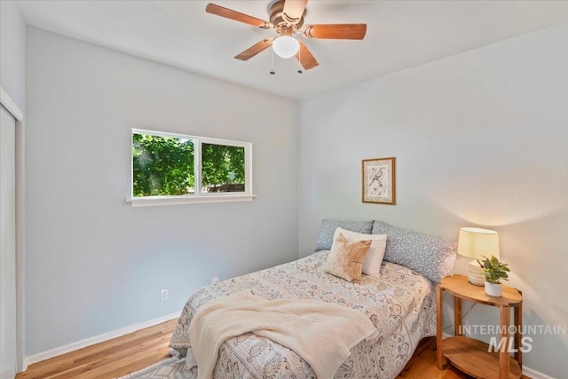 1325 E 5th N, Mountain Home, ID 83647 - bedroom with wood finished floors, baseboards, and ceiling fan