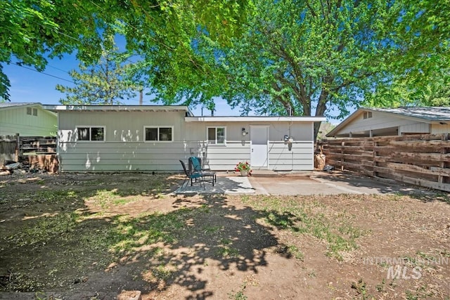 1325 E 5th N, Mountain Home, ID 83647 - back of property featuring a patio