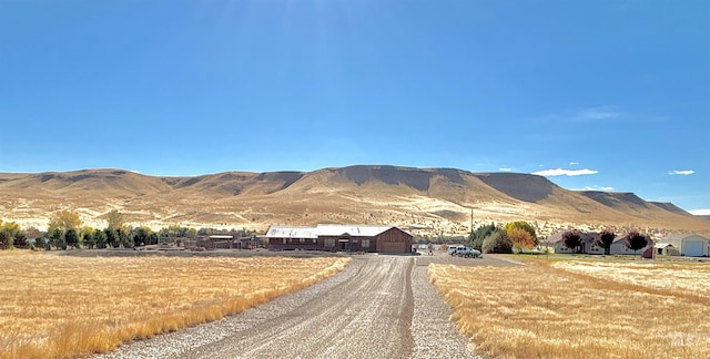 property view of mountains featuring a rural view