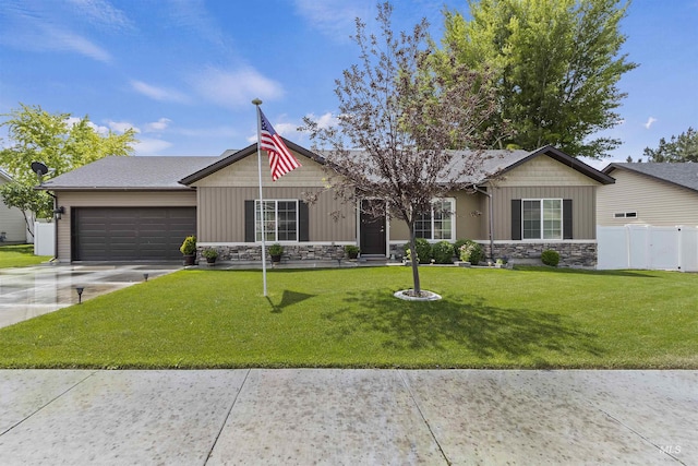 1011 Lynx, Jerome, ID 83338 - ranch-style house featuring stone siding, an attached garage, and concrete driveway