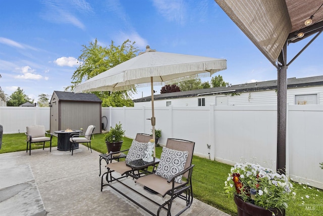 1011 Lynx, Jerome, ID 83338 - fenced backyard featuring an outdoor fire pit, a patio area, and a shed