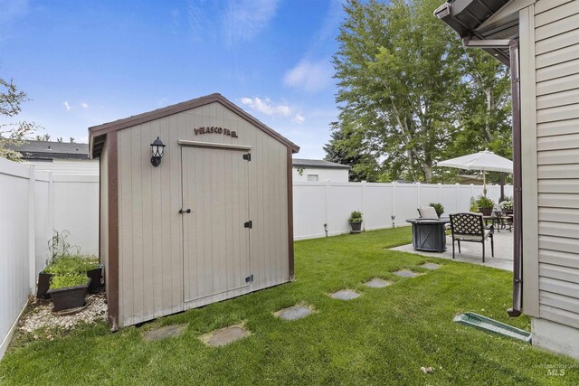 1011 Lynx, Jerome, ID 83338 - fenced backyard featuring a shed and a patio
