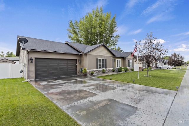 1011 Lynx, Jerome, ID 83338 - ranch-style home with a garage, concrete driveway, and stone siding