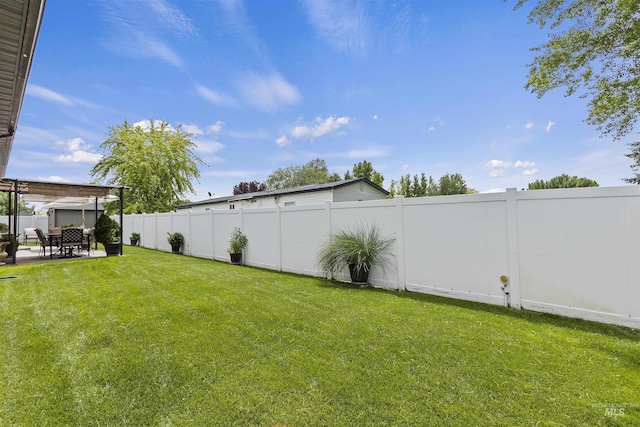 1011 Lynx, Jerome, ID 83338 - fenced backyard with a patio