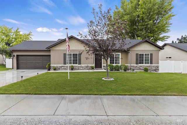 1011 Lynx, Jerome, ID 83338 - ranch-style home featuring stone siding, an attached garage, driveway, and board and batten siding