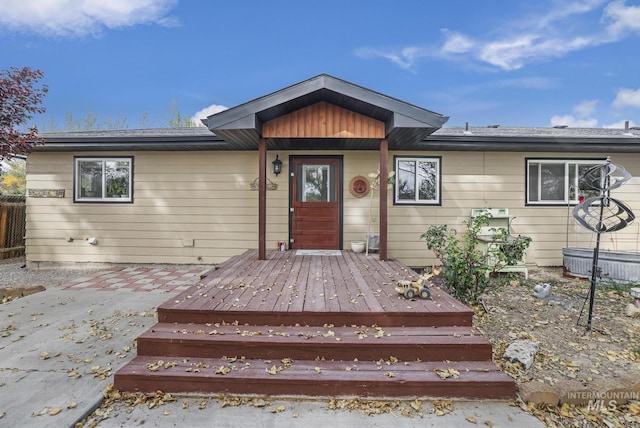 ranch-style house featuring a deck