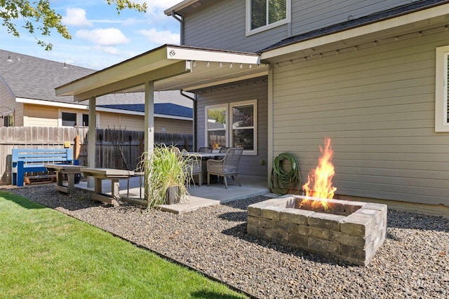 view of patio / terrace featuring a fire pit