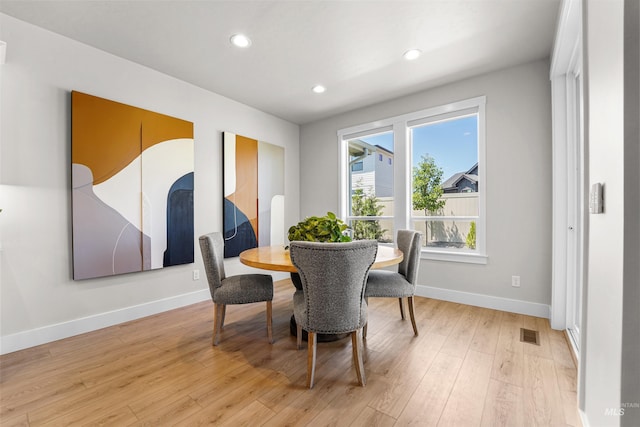 3067 N Sun City Ave, Star, ID 83669 - dining space with light wood-type flooring and recessed lighting