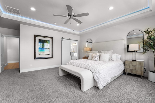 3067 N Sun City Ave, Star, ID 83669 - bedroom with a raised ceiling, carpet, a barn door, recessed lighting, and ceiling fan