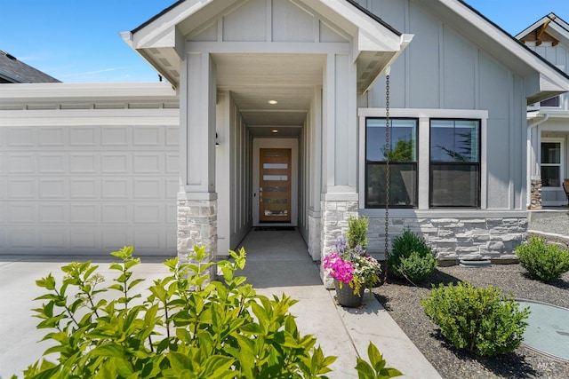 3067 N Sun City Ave, Star, ID 83669 - property entrance featuring board and batten siding, stone siding, and an attached garage