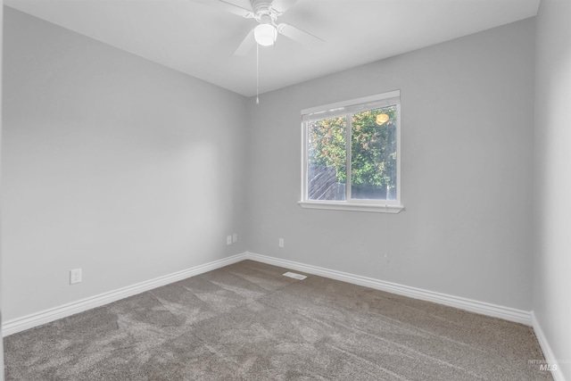 4104 Iris Ct, Nampa, ID 83687 - empty room with dark colored carpet, baseboards, and a ceiling fan