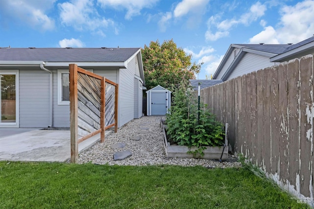 4104 Iris Ct, Nampa, ID 83687 - view of yard featuring a vegetable garden and a patio area