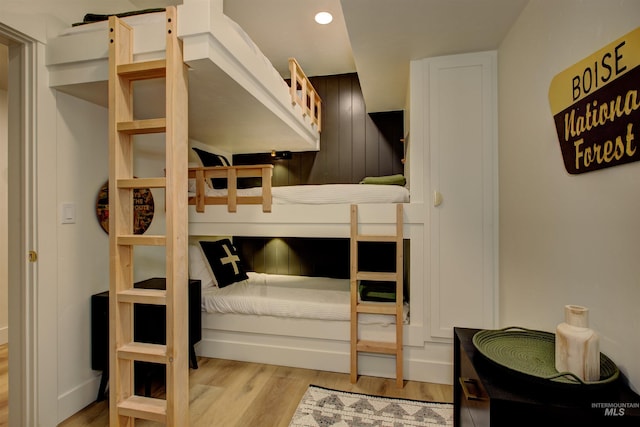 bedroom featuring wood finished floors