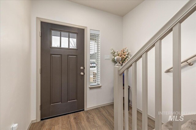 7566 W Corona Dr, Boise, ID 83709 - entryway featuring wood finished floors and baseboards