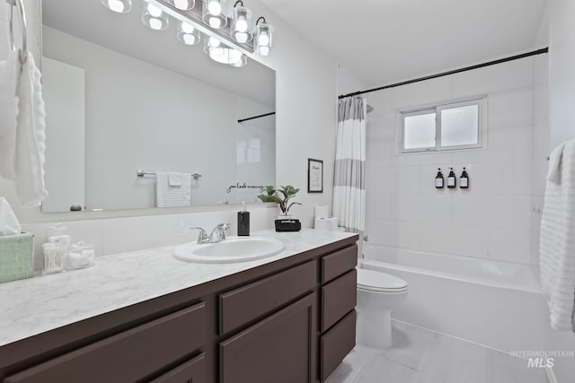 full bath featuring vanity, tile patterned flooring, shower / bath combo, and toilet