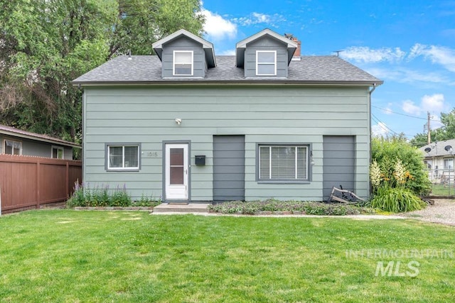 1015 E Park, Weiser, ID 83672 - view of front of property featuring a shingled roof and a chimney