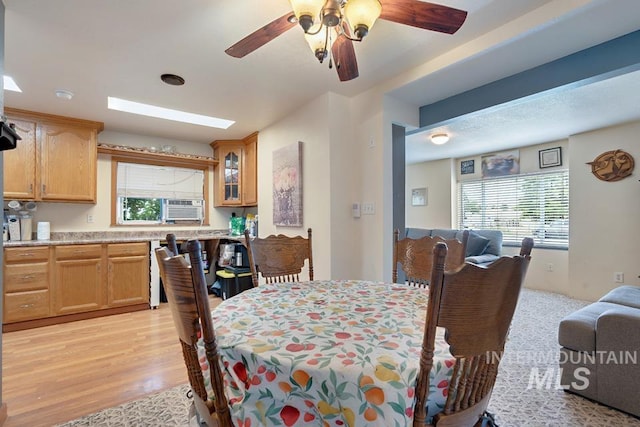 1015 E Park, Weiser, ID 83672 - dining space with healthy amount of natural light, ceiling fan, light wood finished floors, and cooling unit