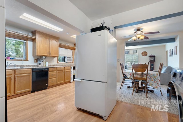 1015 E Park, Weiser, ID 83672 - kitchen with freestanding refrigerator, dishwasher, light wood-style floors, light brown cabinetry, and ceiling fan
