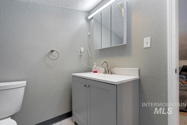 1015 E Park, Weiser, ID 83672 - bathroom with vanity and a textured wall