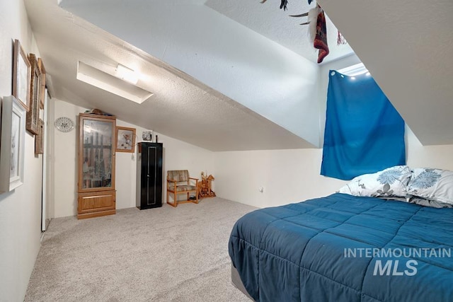 1015 E Park, Weiser, ID 83672 - carpeted bedroom with lofted ceiling and a textured ceiling