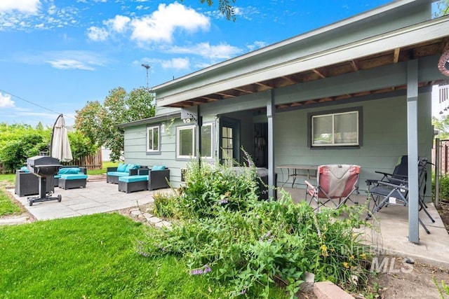 1015 E Park, Weiser, ID 83672 - rear view of house with an outdoor living space and a patio