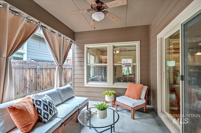 1512 N 28th St, Boise, ID 83703 - sunroom with wooden walls, healthy amount of natural light, and concrete floors