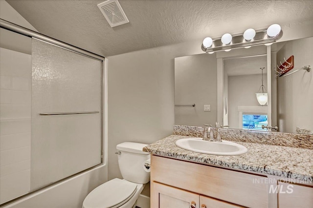 1512 N 28th St, Boise, ID 83703 - full bath with vanity, enclosed tub / shower combo, toilet, and a textured ceiling