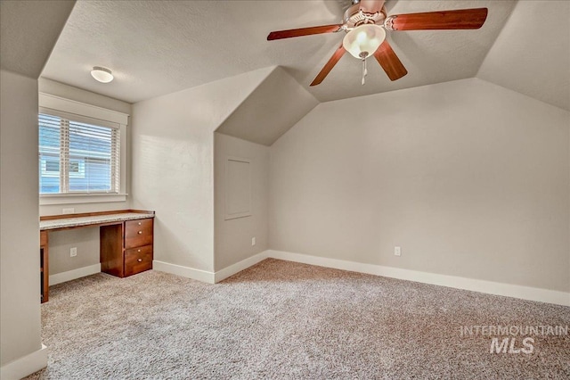 1512 N 28th St, Boise, ID 83703 - bonus room featuring lofted ceiling, light carpet, baseboards, a textured ceiling, and a ceiling fan