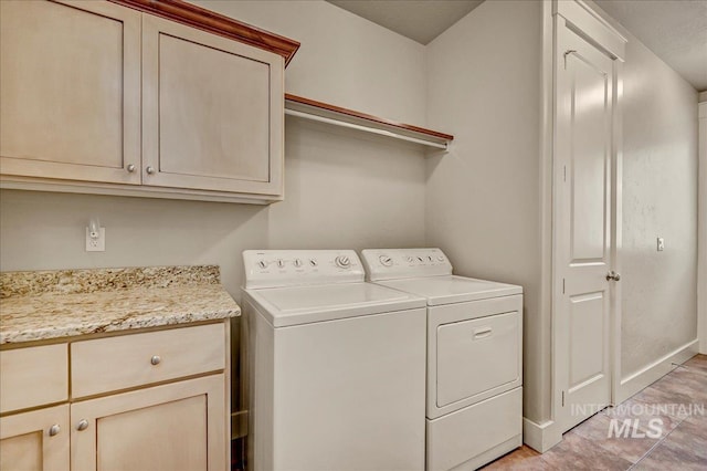 1512 N 28th St, Boise, ID 83703 - laundry area featuring separate washer and dryer, cabinet space, and baseboards