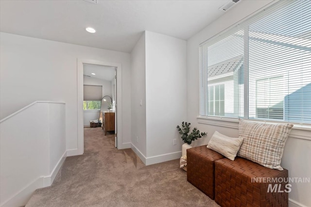 sitting room featuring recessed lighting, baseboards, light colored carpet, and visible vents