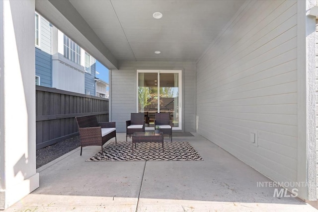 view of patio / terrace with fence and outdoor lounge area