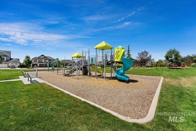 community play area with a lawn
