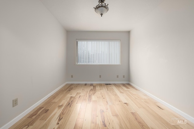 empty room featuring light hardwood / wood-style flooring