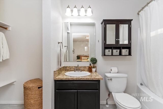 full bathroom featuring tile patterned flooring, vanity, baseboards, toilet, and shower / bathtub combination with curtain