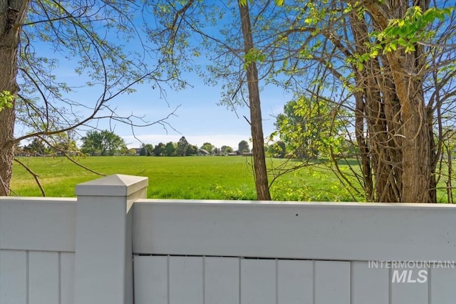 exterior space with a rural view