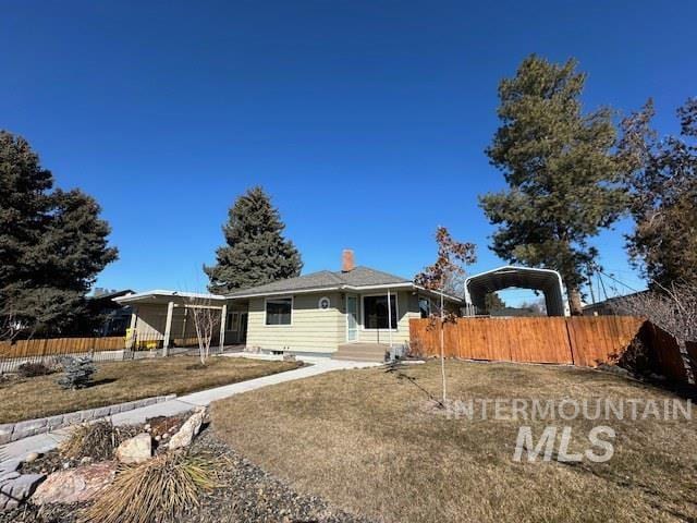 view of front of home with fence