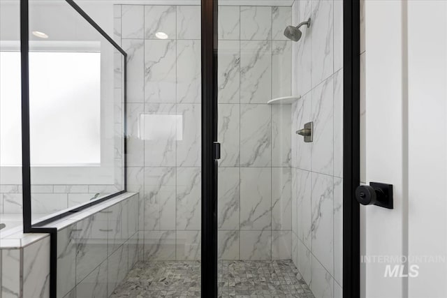 bathroom with a stall shower