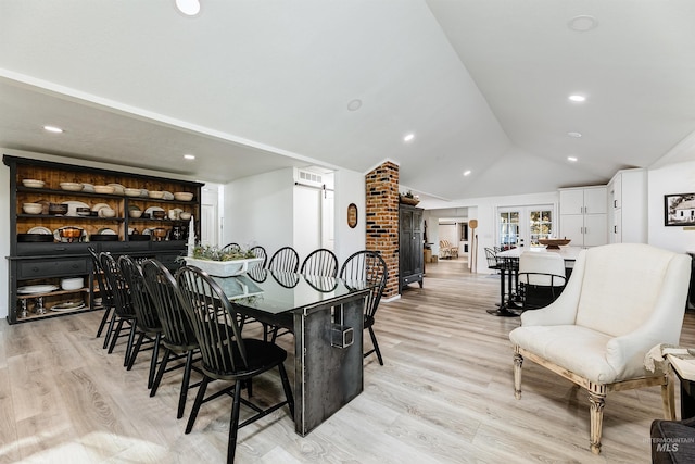 5750 W Dry Creek Rd, Boise, ID 83714 - dining area with recessed lighting, light wood finished floors, and vaulted ceiling