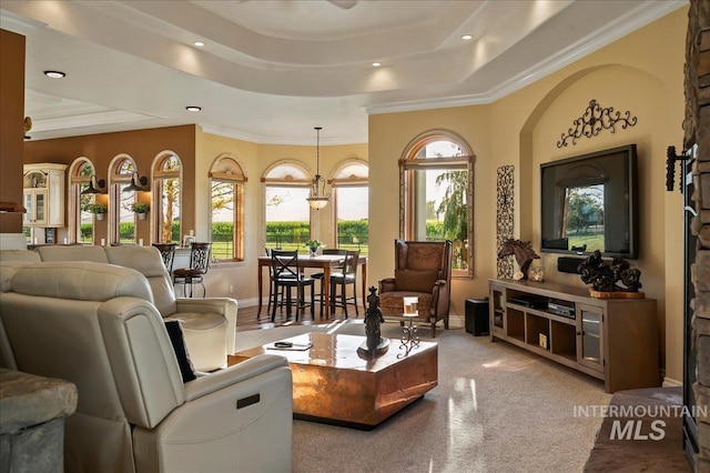 9105 W Mcmillan, Nampa, ID 83687 - living room featuring plenty of natural light, a tray ceiling, recessed lighting, carpet flooring, and ornamental molding