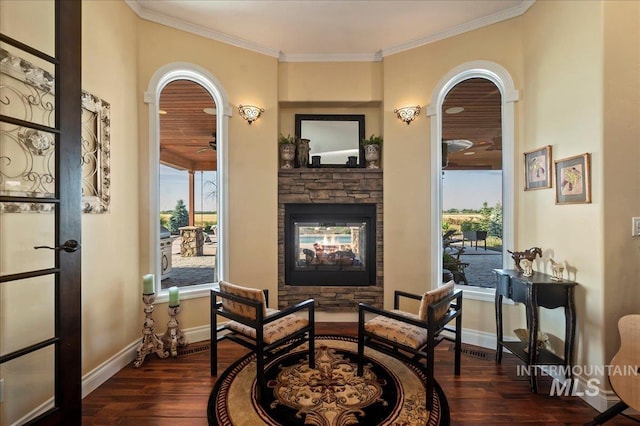 9105 W Mcmillan, Nampa, ID 83687 - sitting room featuring wood finished floors, ceiling fan, healthy amount of natural light, and ornamental molding