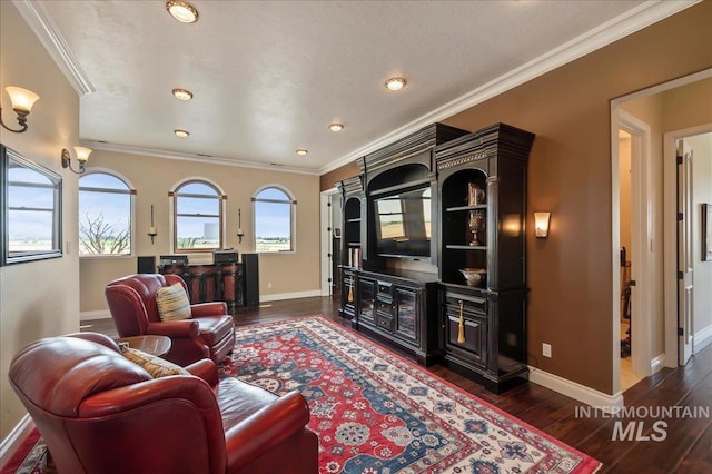 9105 W Mcmillan, Nampa, ID 83687 - living area with ornamental molding, baseboards, dark wood finished floors, and recessed lighting