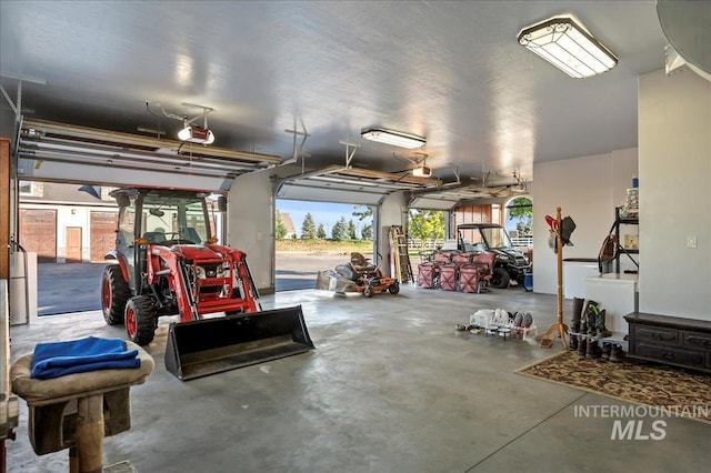 9105 W Mcmillan, Nampa, ID 83687 - garage featuring a garage door opener