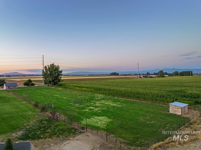 9105 W Mcmillan, Nampa, ID 83687 - yard at dusk featuring a rural view