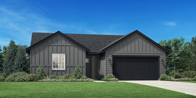 view of front of property featuring a garage and a front lawn