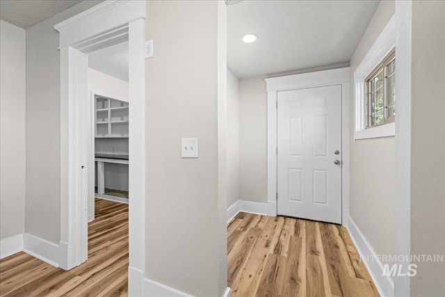 803 4th St S, Nampa, ID 83651 - interior space featuring light wood-type flooring and baseboards