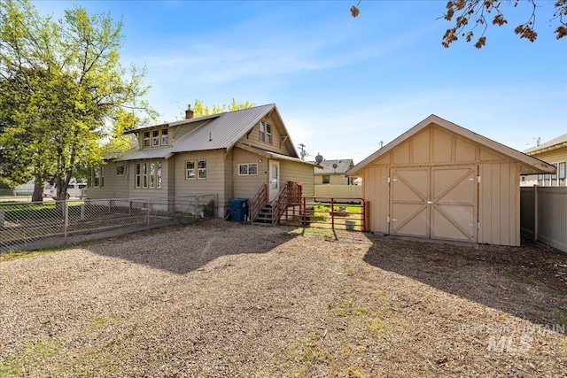 803 4th St S, Nampa, ID 83651 - view of side of property with a storage shed, a fenced backyard, and an outdoor structure