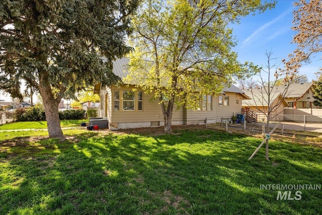 803 4th St S, Nampa, ID 83651 - view of yard with central AC and fence