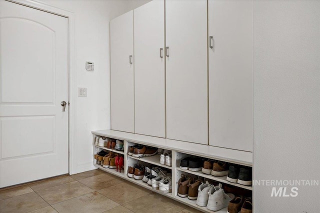 2873 W Wind Dr, Eagle, ID 83616 - mudroom with light tile patterned floors