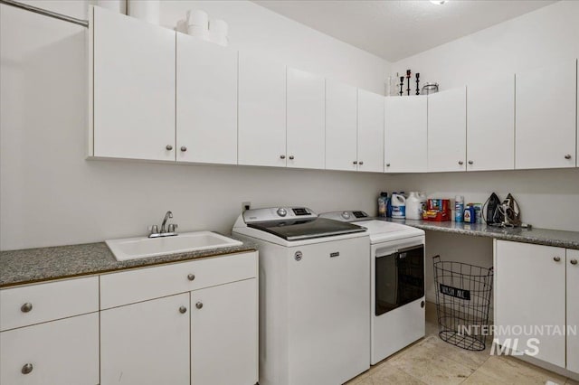 2873 W Wind Dr, Eagle, ID 83616 - clothes washing area featuring cabinets, separate washer and dryer, and sink